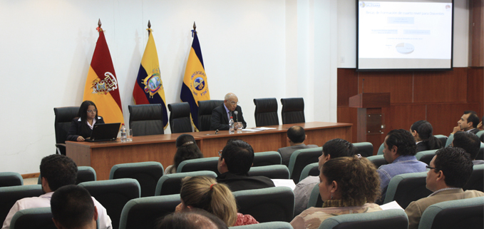 Padre Javier Herrán, rector de la UPS, presentando el informe a la ciudadania