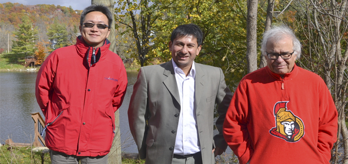 Dr. Wei Tien Hsiao, Dr. Luis Garzón, Dr. Y- Haddad en el Gatineau Park, Ontario-Quebec.