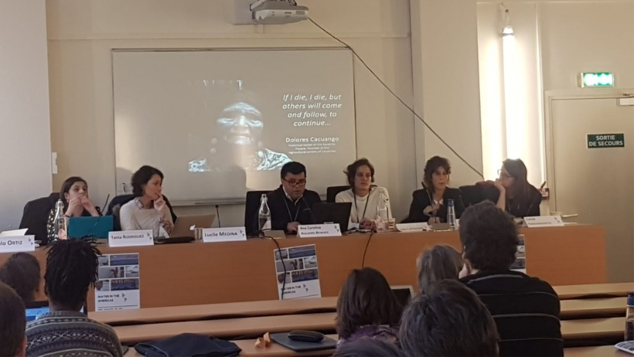 Exposición de profesor Pablo Ortiz (c), en el panel