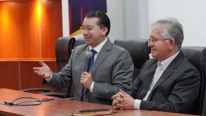 Father Juan Cárdenas welcomes Father Marcelo Farfán